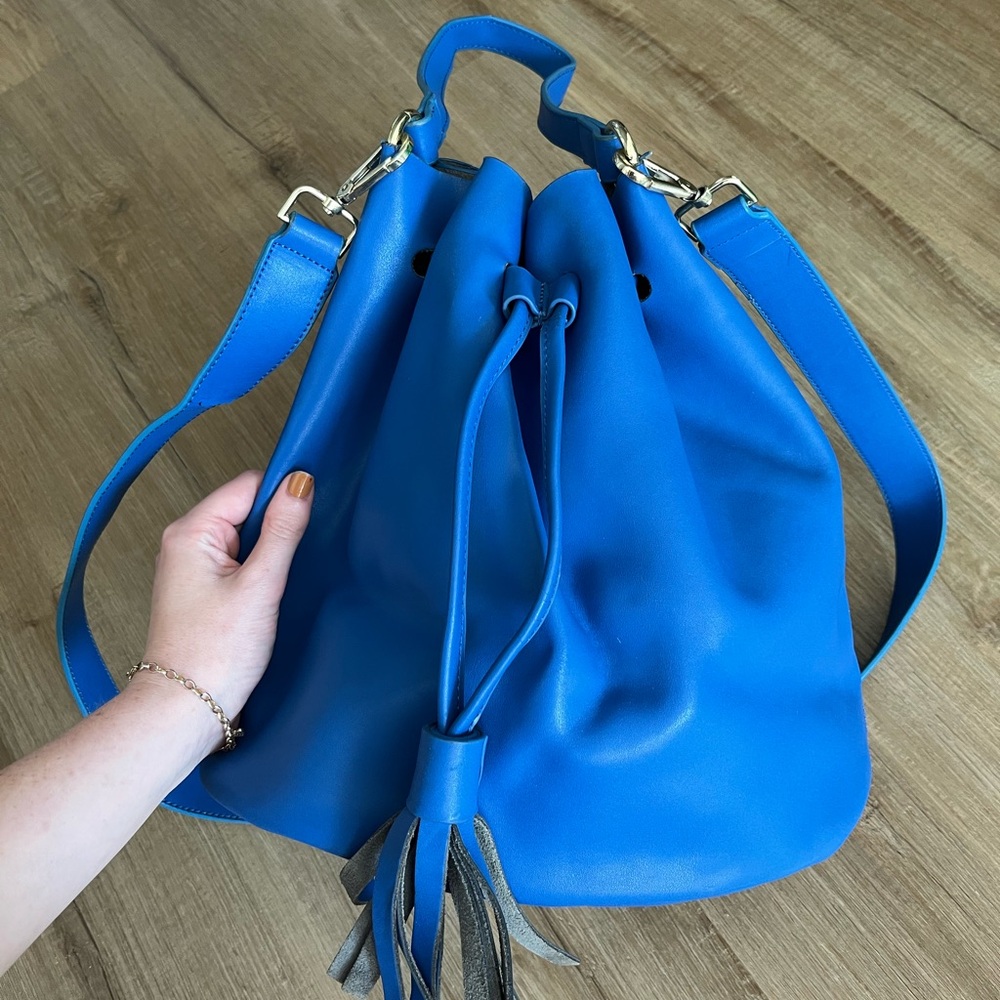 Blue leather bucket bag draw string crossbody strap